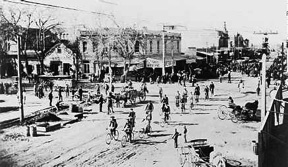 Photo of Cyclists at Washington and First Strees in late 1880s