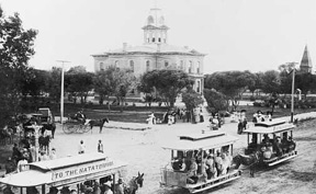 Photo of horse-drawn streetcar by old courthouse in 1890s