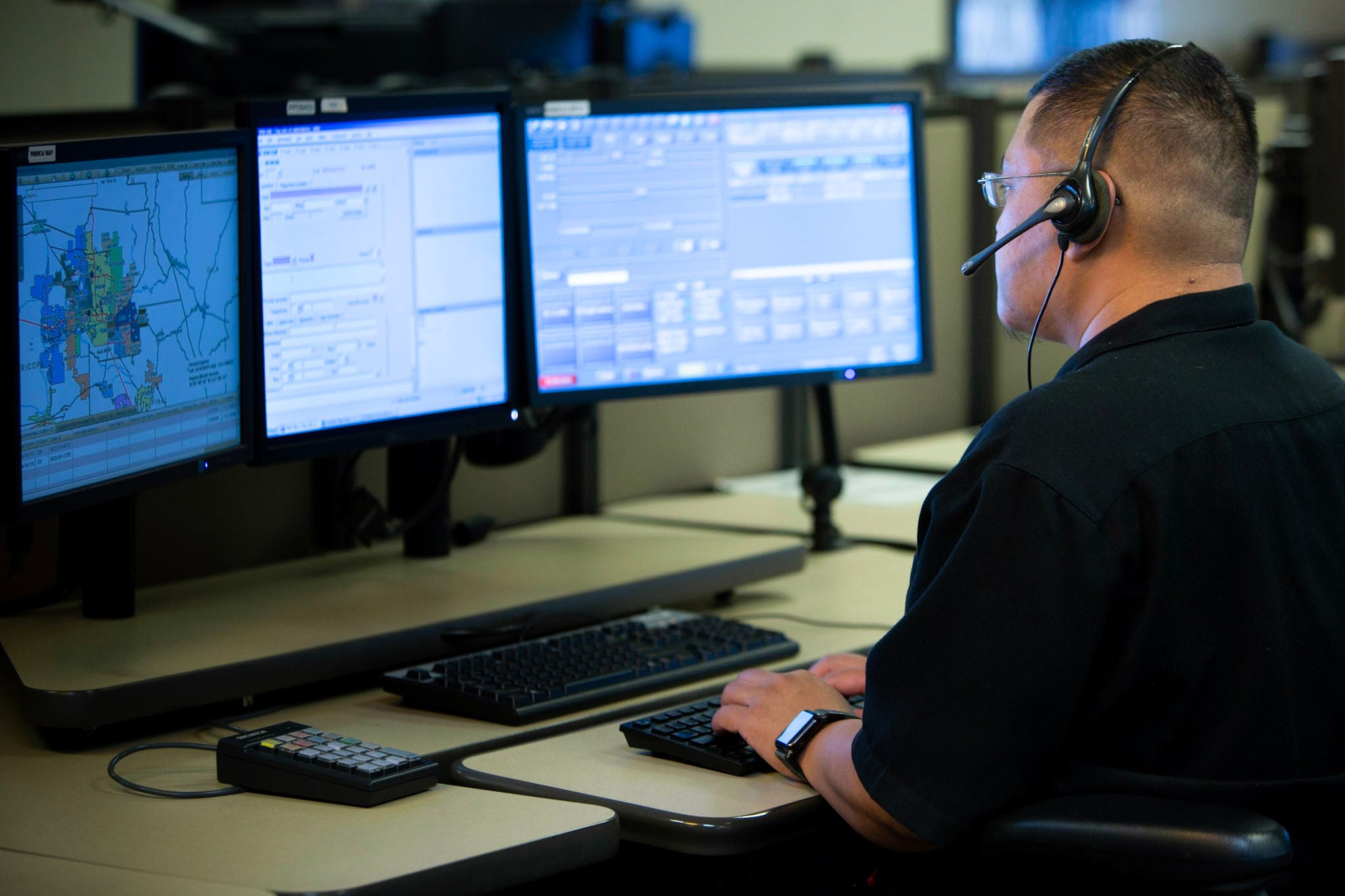 Police Department - Public Safety Services - Man at computer