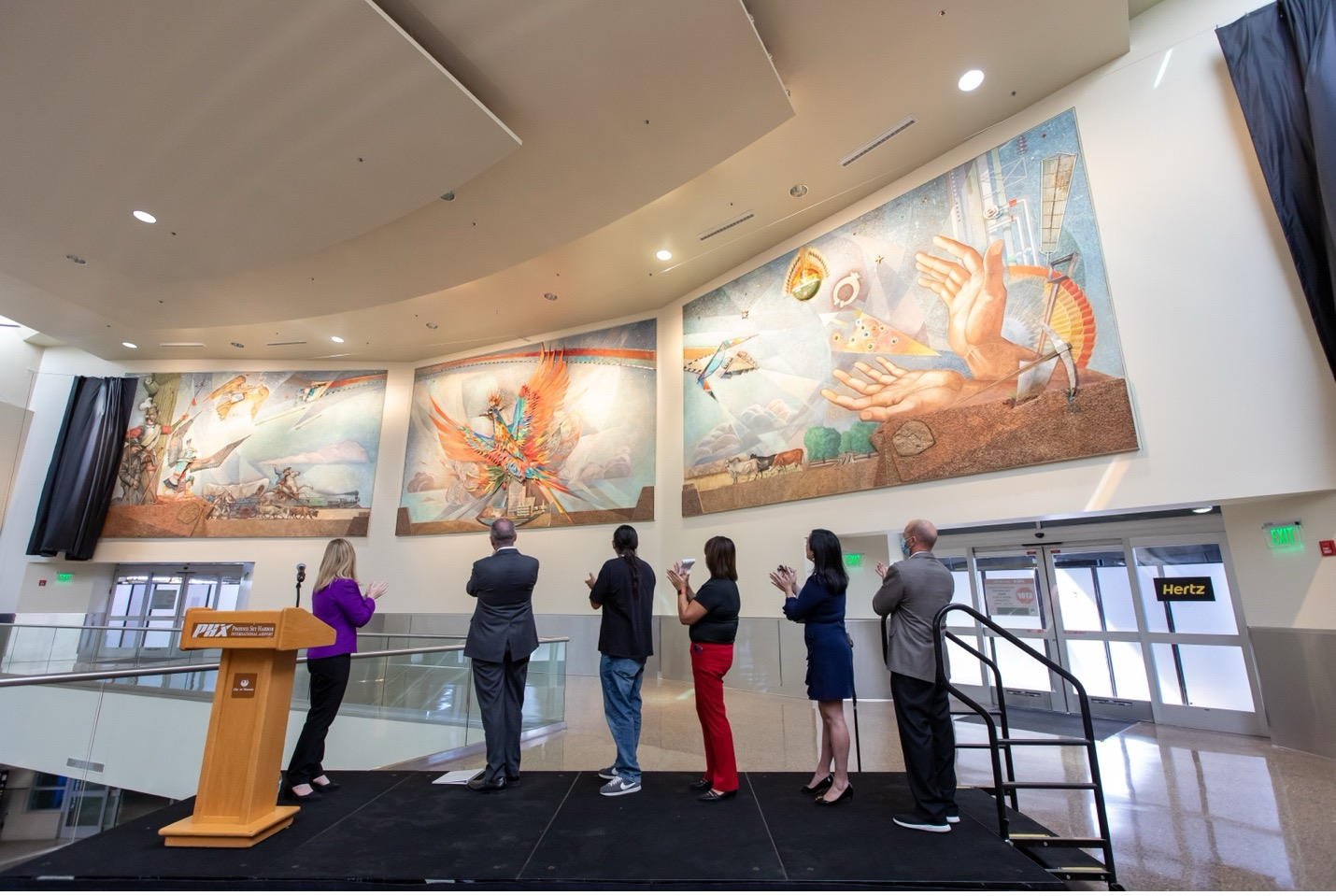 Mayor Kate Gallego unveiling the mural at the Rental Car Center in 2021