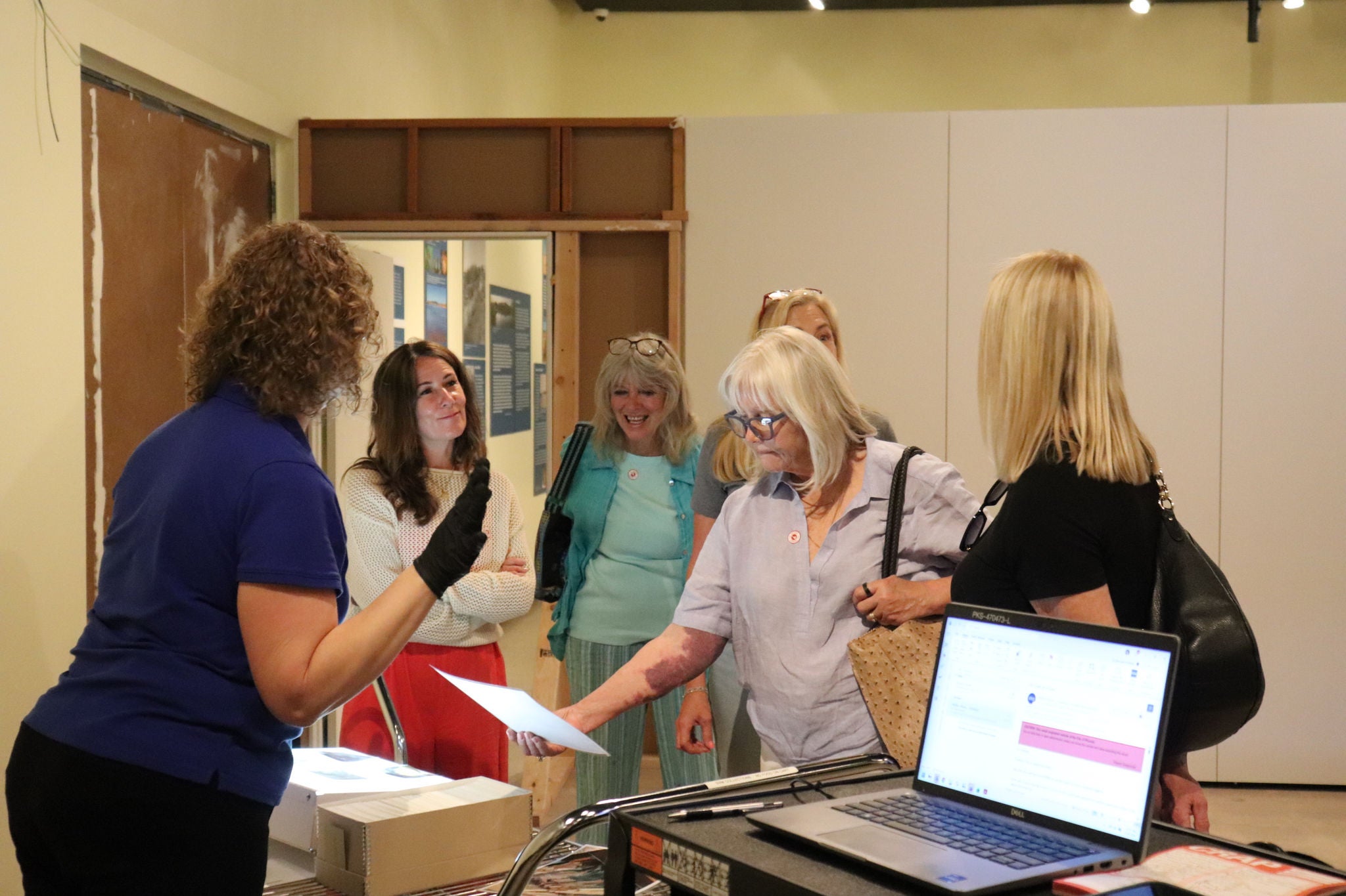 Curatorial demonstration with Achrival photos from International Museum Day 2026.