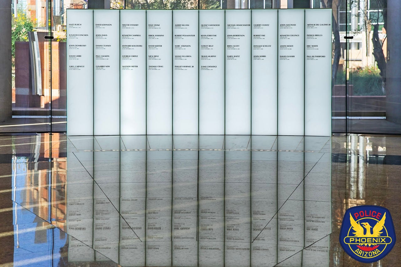 Memorial wall at 100 west headquarters