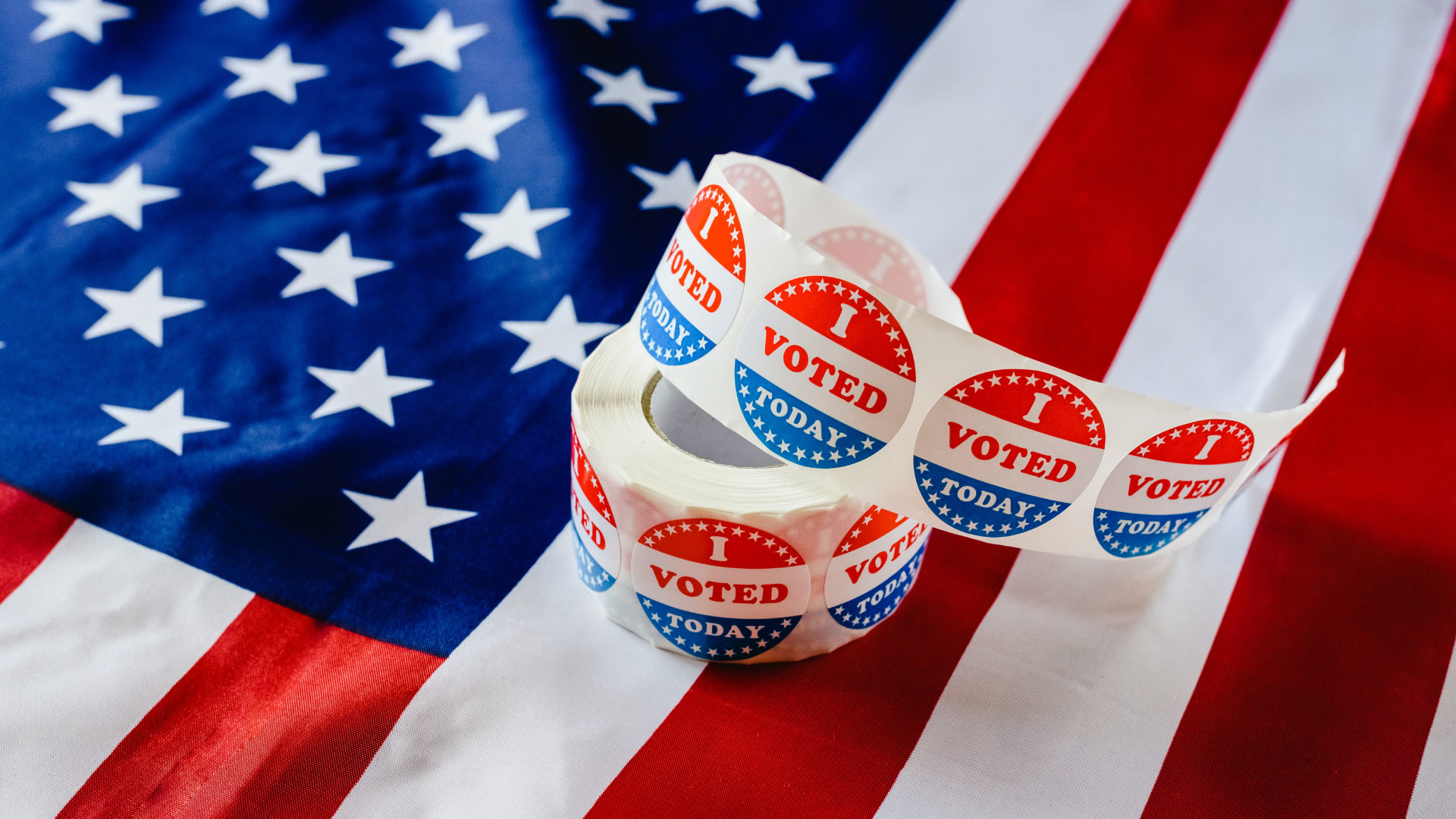 graphic of American flag with voter materials on it