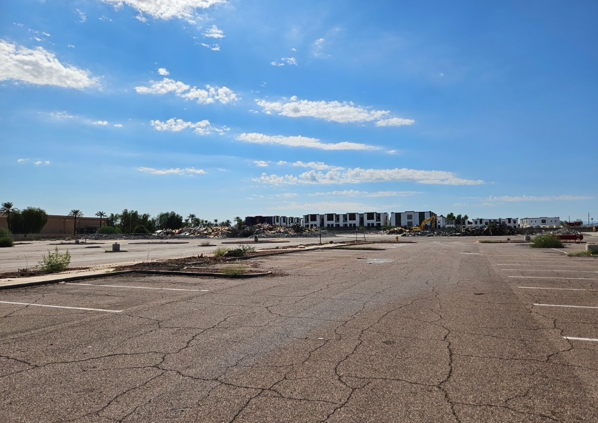 Empty lot after demolition of the former electronics store.