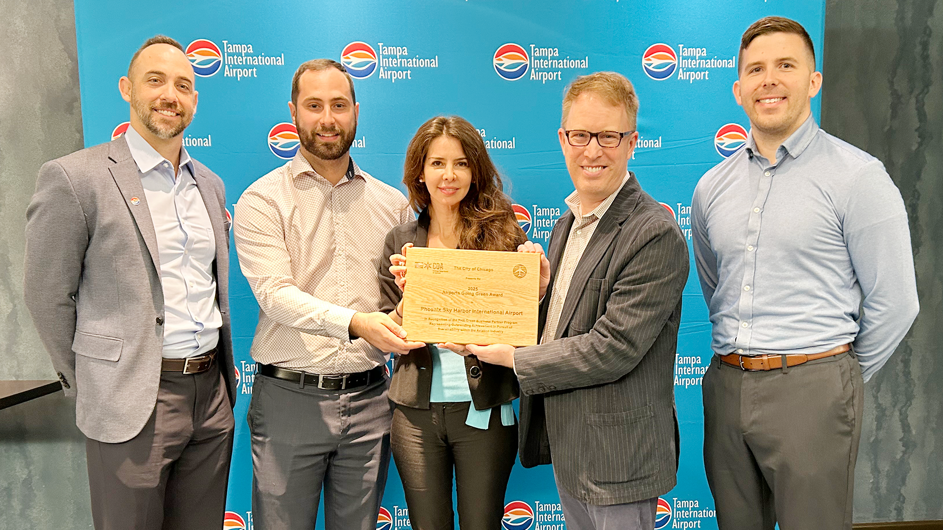 PHX staff receiving Airports Going Green Award.