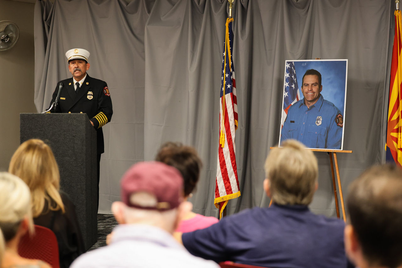 Fire Chief Mike Duran speaks at Adam Cauthron's posthumous Promotion Ceremony.
