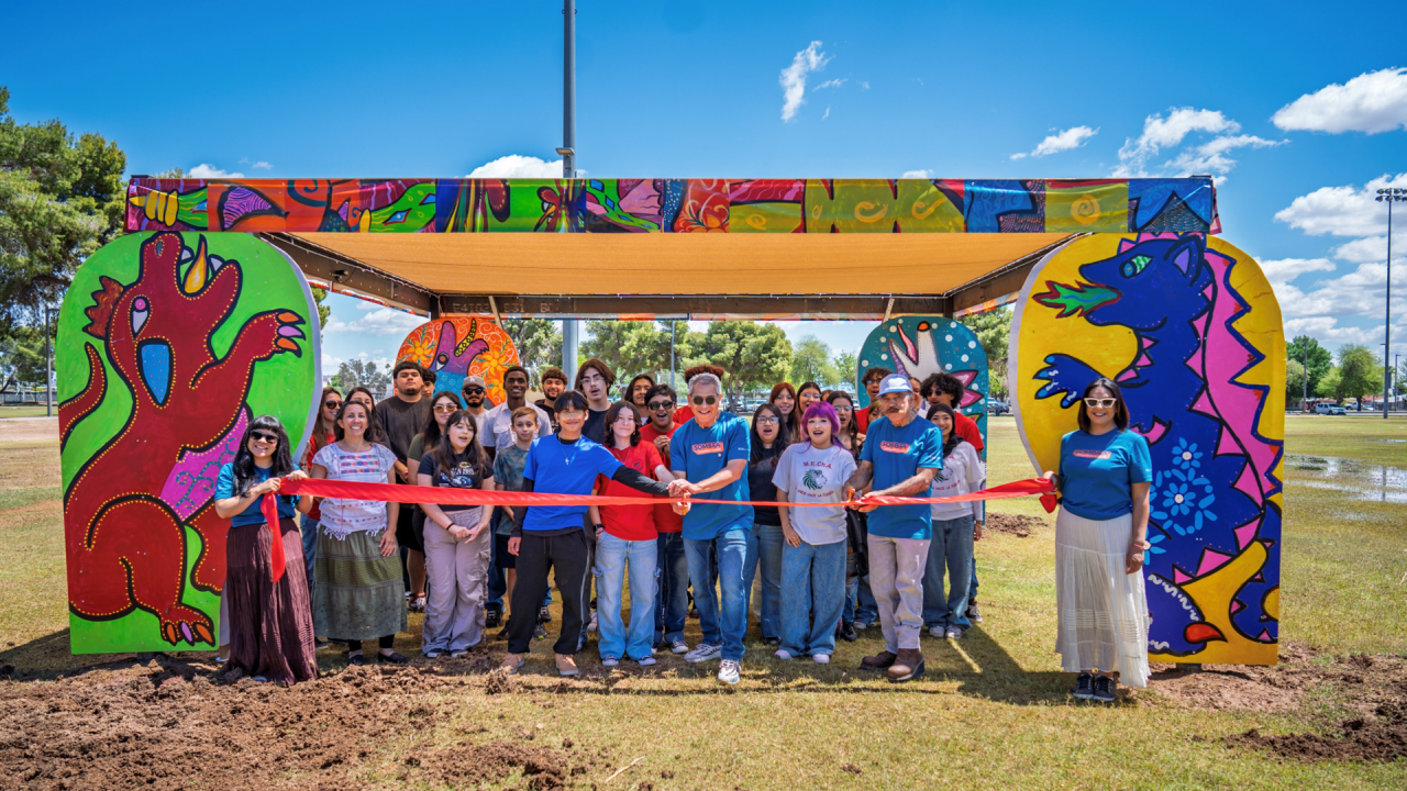 City leaders and residents unveiling Rincón de Color shade structure at Cielito Park.