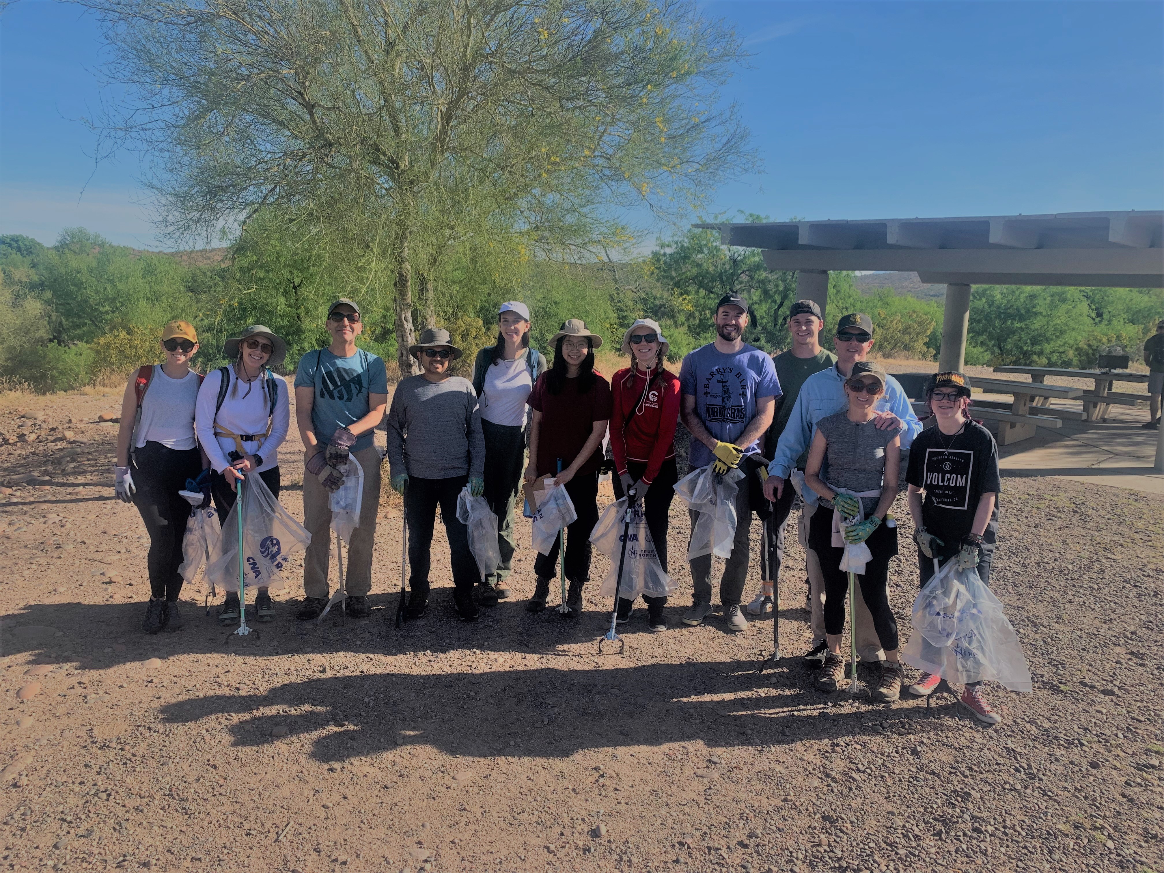 A group of HDR employees posing for a photo during the 2023 Earth Day clean-up at the Phon D. Sutton Recreation Area.