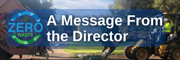 'A Message From the Director' in front of bulk trash crews