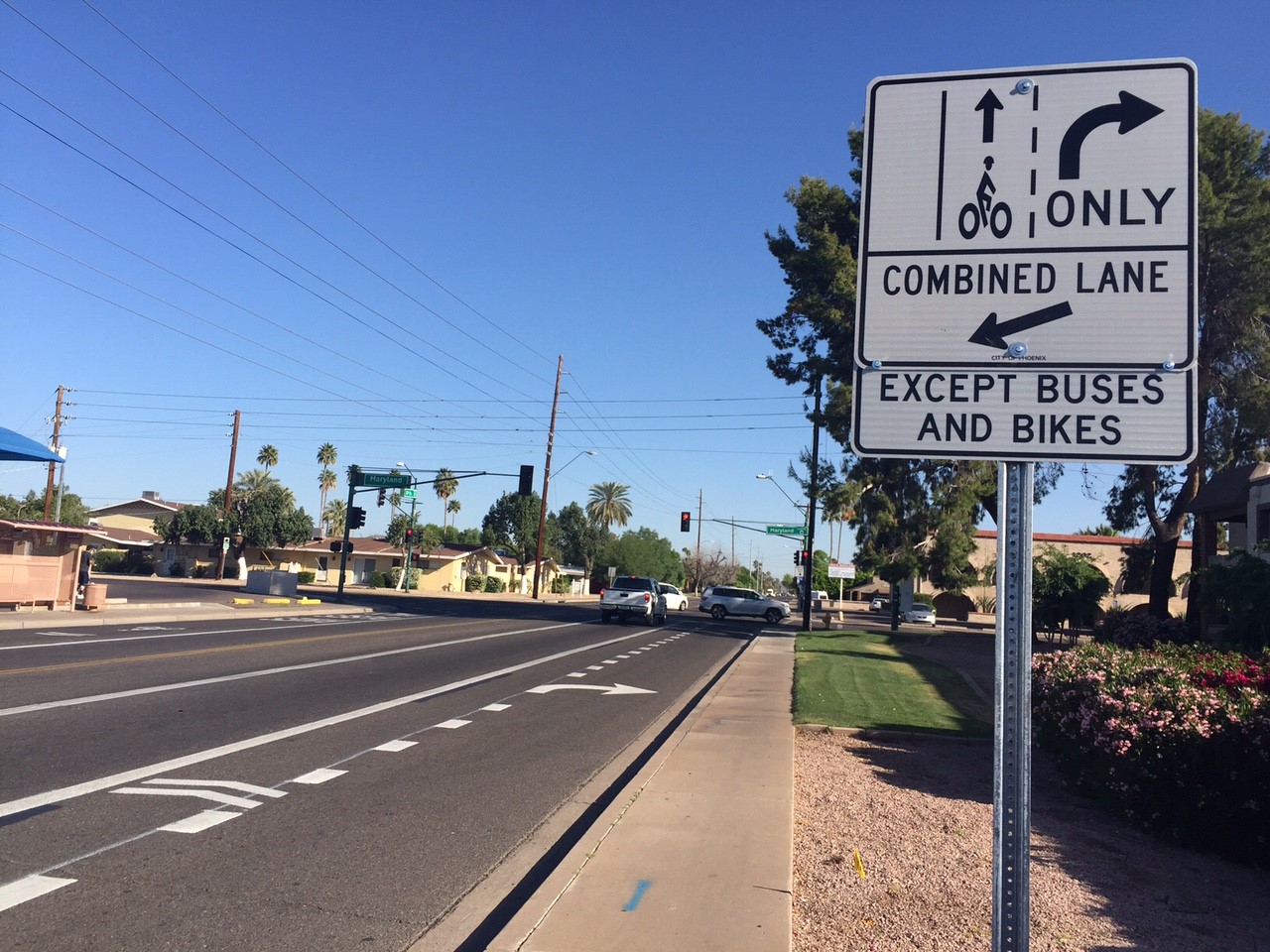 Street sign showing bike lane