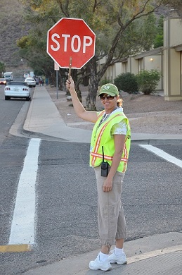 School crossing guard holding stop sign
