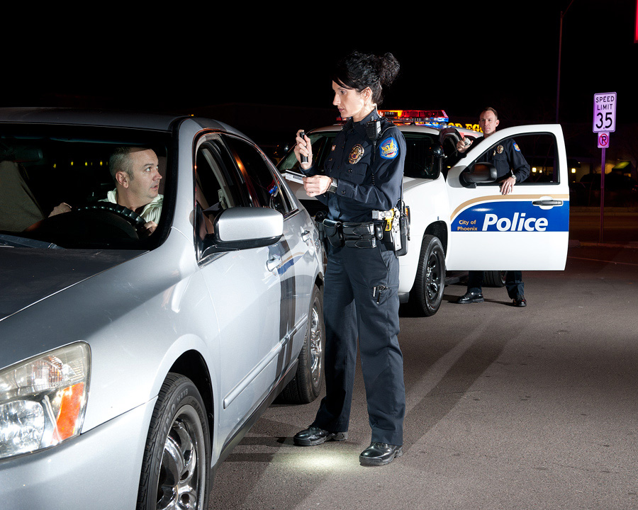 Police reserve officer at night traffic stop