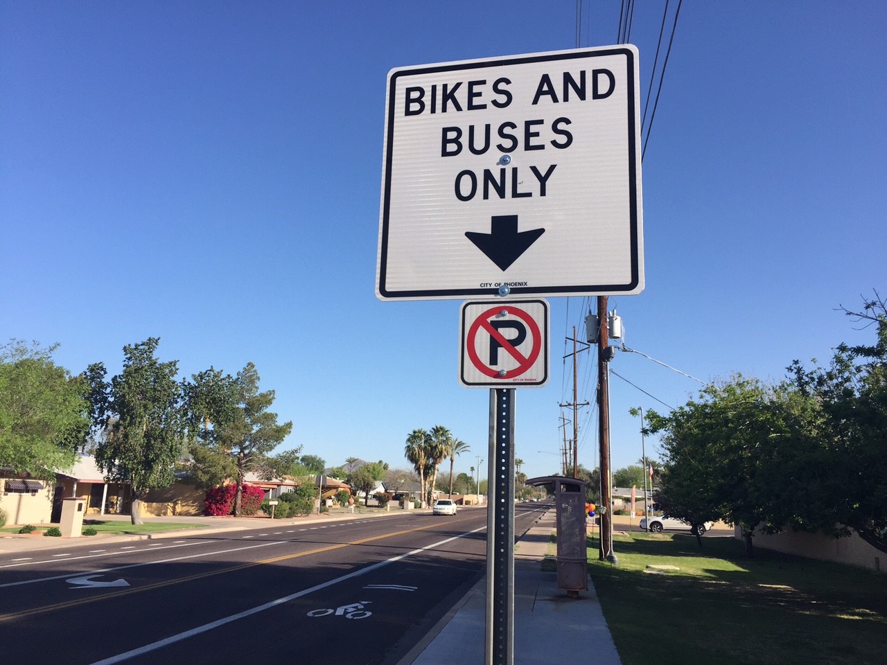 Sign saying bikes and buses only